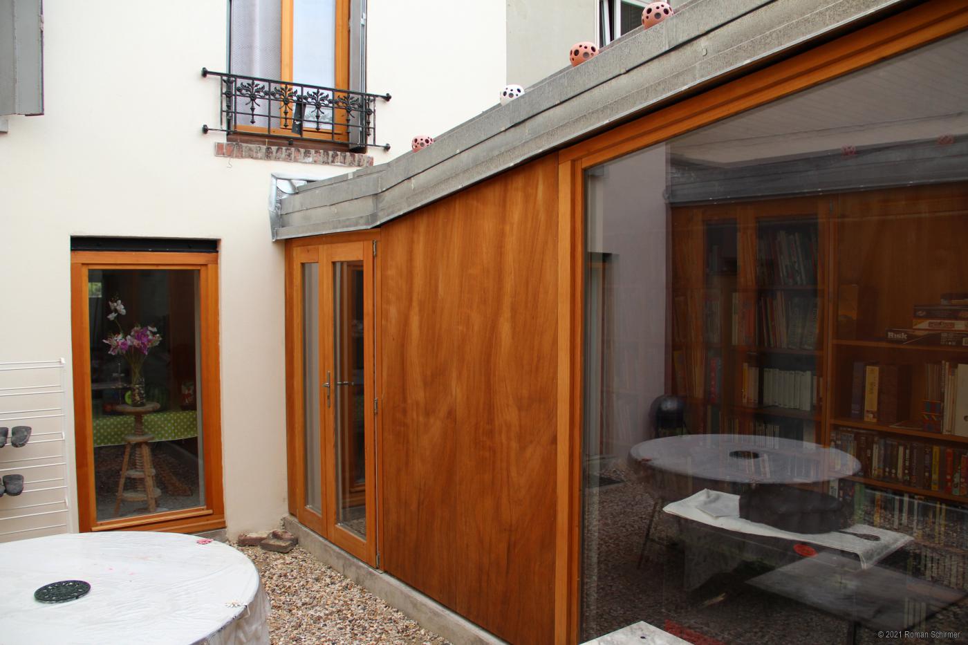 Extension and transformation of a House around a Patio